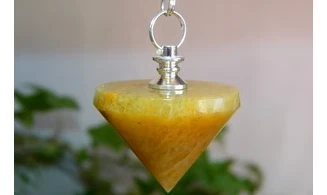 Orange Calcite cone pendulum
