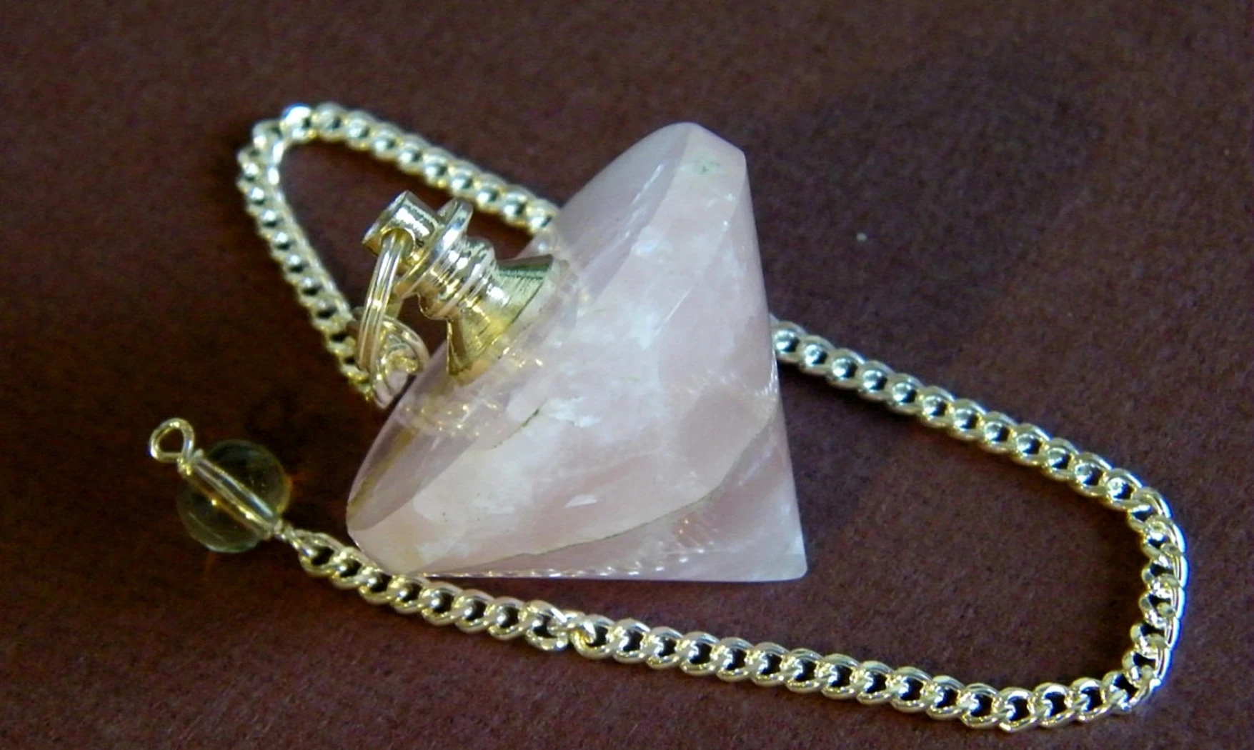 Quartz rose pierre Toupie pendule