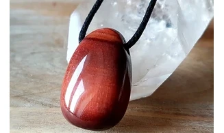 Oeil de Taureau pierre percée pendentif