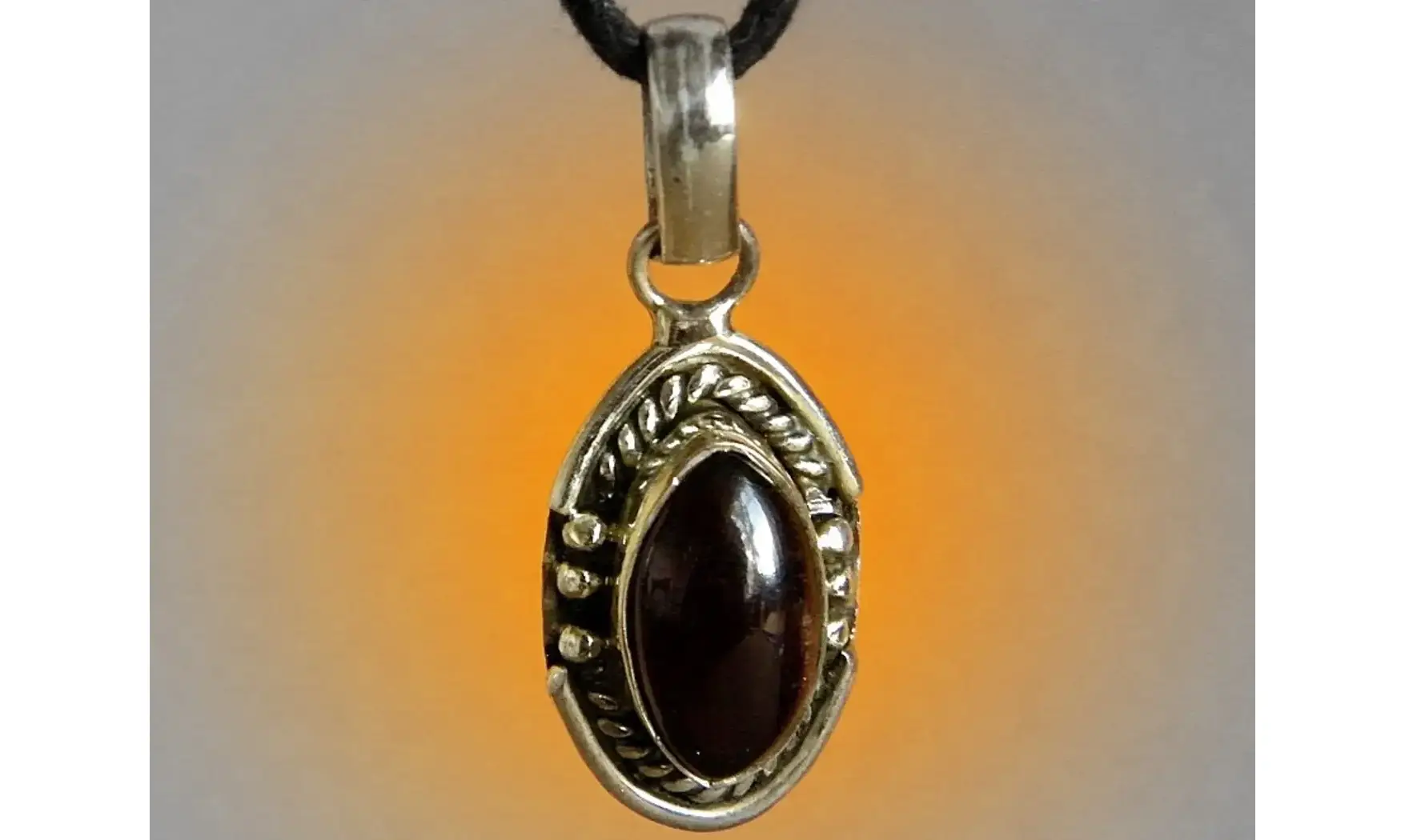 Garnet & 925 Silver plated pendant