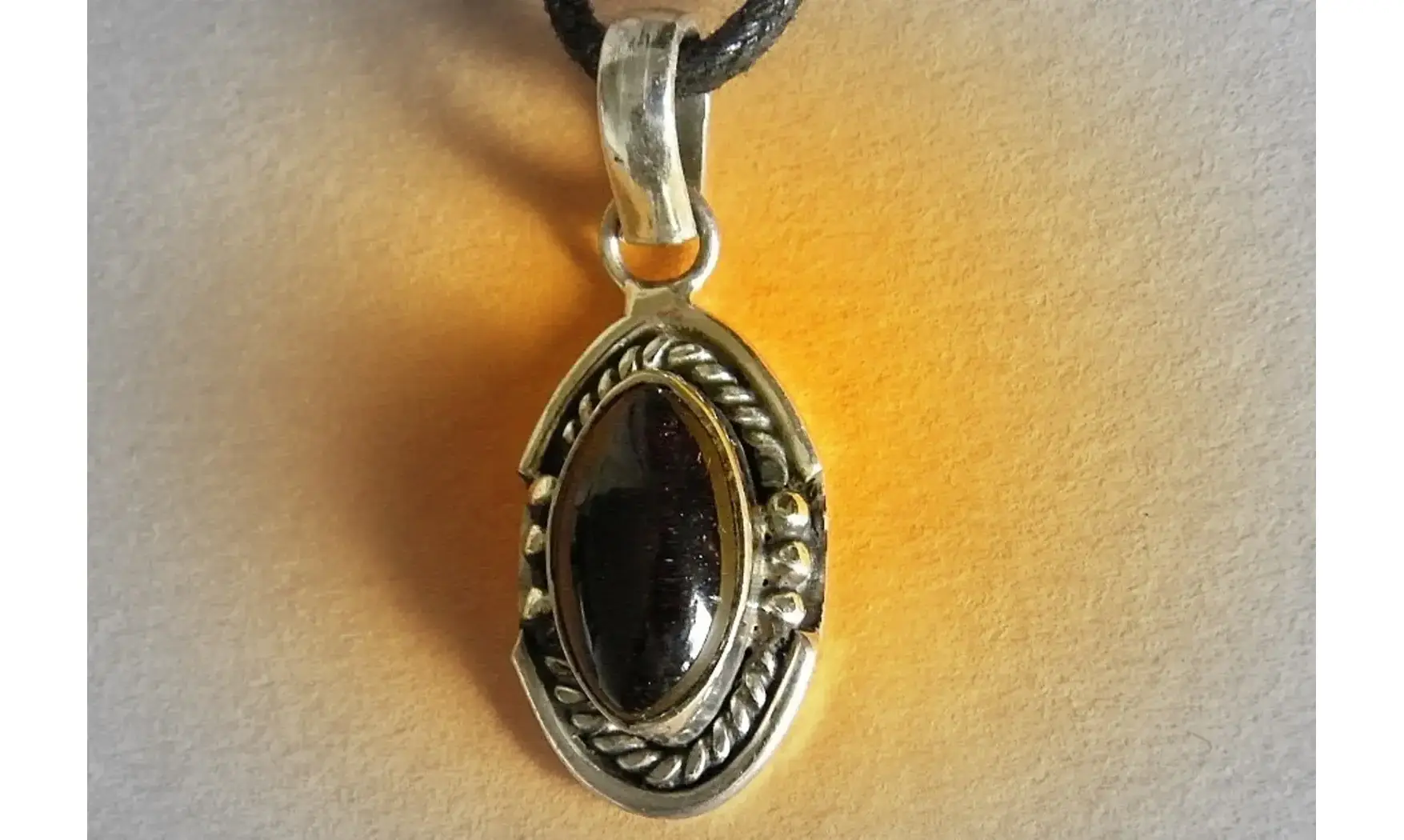 Garnet & 925 Silver plated pendant