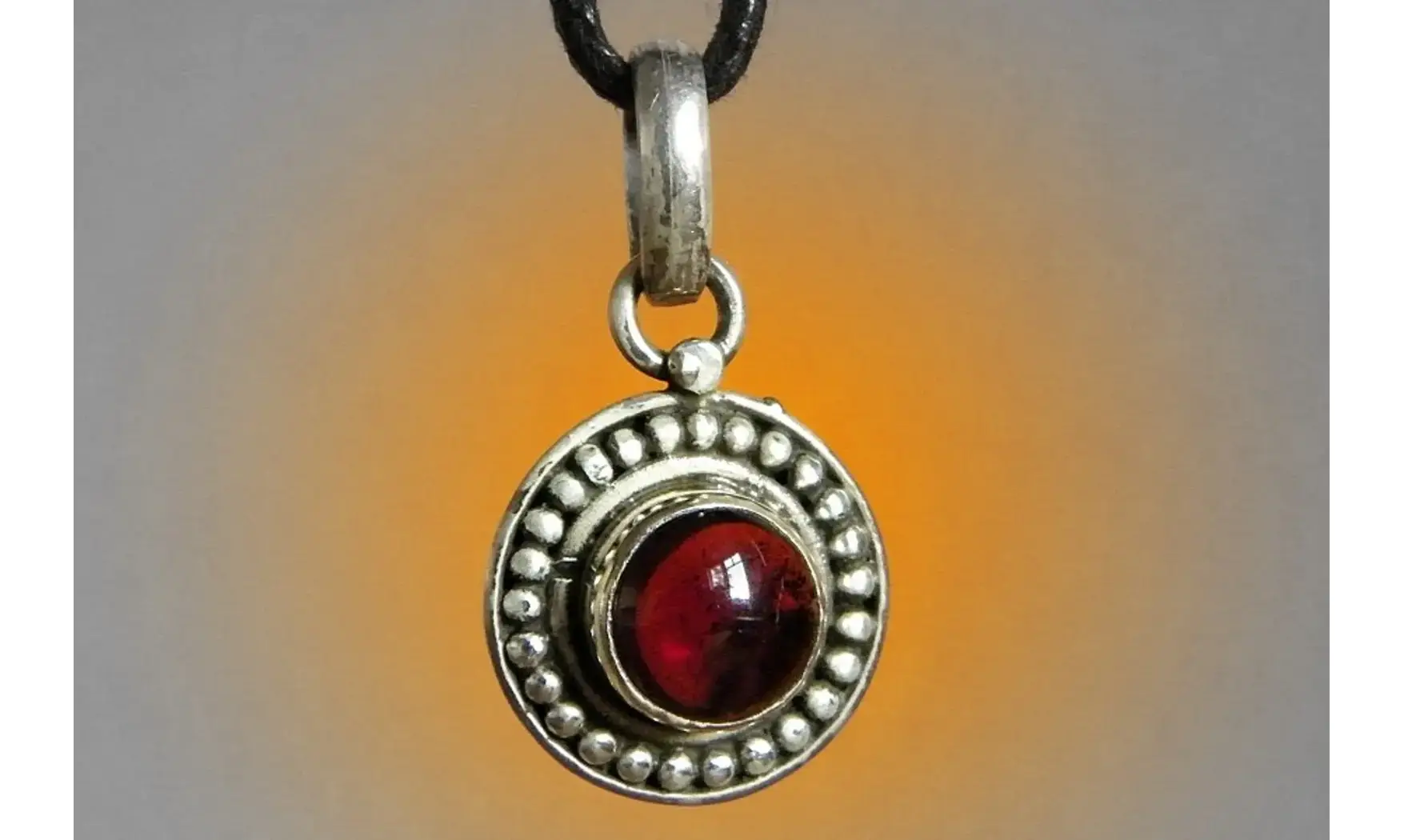 Garnet & 925 Silver plated pendant