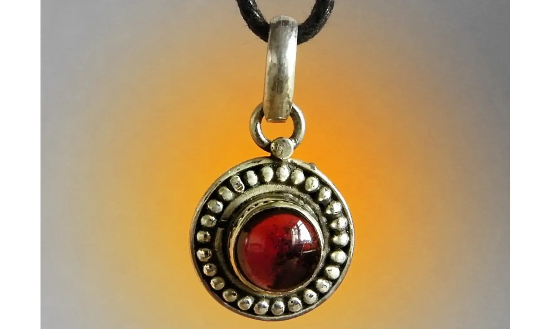 Garnet & 925 Silver plated pendant