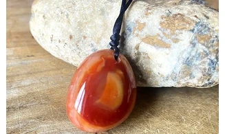 Cornelian stone drilled pendant C