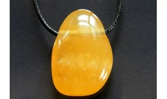 Orange Calcite stone drilled pendant