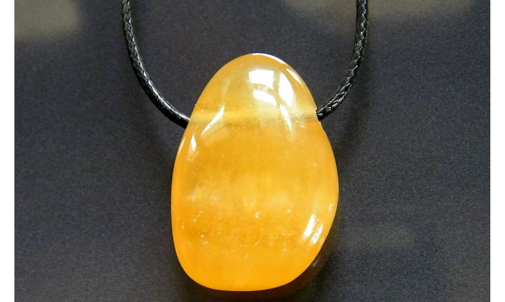 Calcite orange pierre percée pendentif