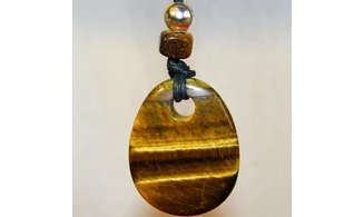Tiger Eye drilled stone pendant