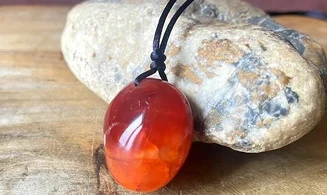 Cornelian stone drilled pendant A