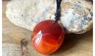 Cornelian stone drilled pendant A