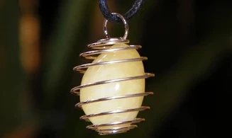 Orange Calcite spiral pendant