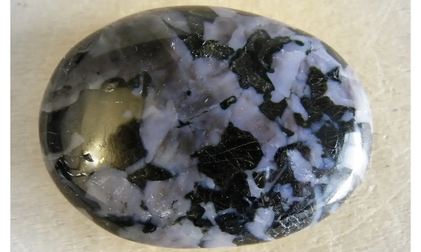 Merlinite Palm Stone