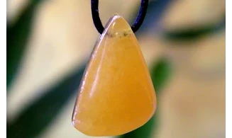 Orange Calcite stone drilled pendant