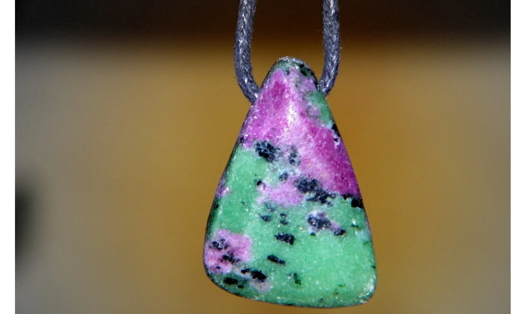 Ruby-Zoisite stone drilled pendant